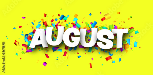August word over colorful cut out ribbon confetti background.