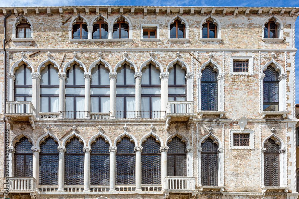 facade of an old venetian palace with closed windows