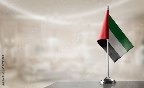 Photography A small Arab Emirates flag on an abstract blurry background