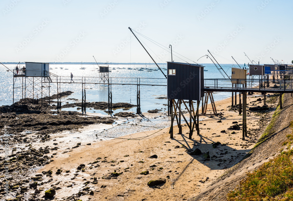 Wooden fishing cabins with a large square lift net called Wooden fishing cabins with a large square lift net called