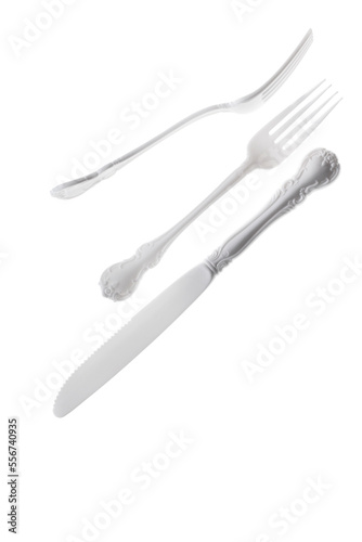 Two fancy white plastic forks and one fancy white plastic knife on a high key white background.