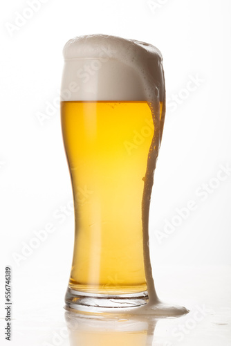 Glass of light beer isolated