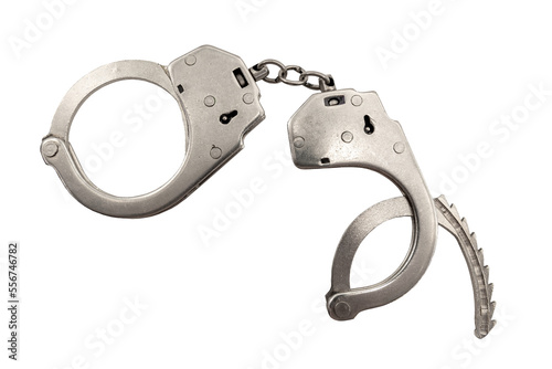 Handcuffs on a white background close-up. Handcuffs isolated. Law. Crime photo