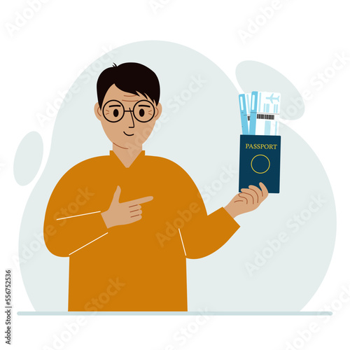 A man holds a passport with air tickets. The man shows the boarding pass. Travel concept.