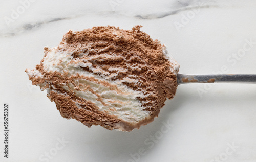 vanilla and chocolate ice cream in a spoon photo