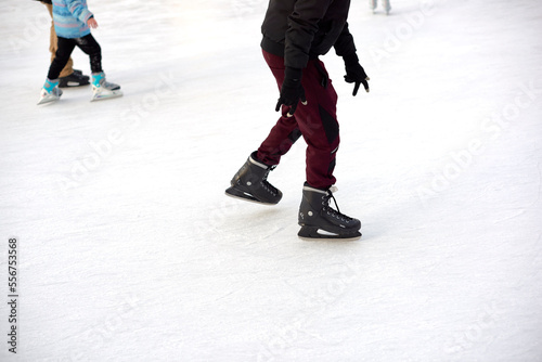 People ice skating.