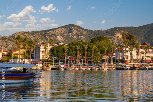 Fototapeta Naklejka Na Ścianę i Meble -  Touristic river boats with tourists in Dalyan resort, Turkey