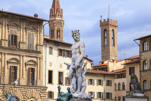 The Fountain of Neptune in the middle of Piazza della Signoria in front of the Palazzo Vecchio in the Old Quarter; Florence, Tuscany, Italy photo