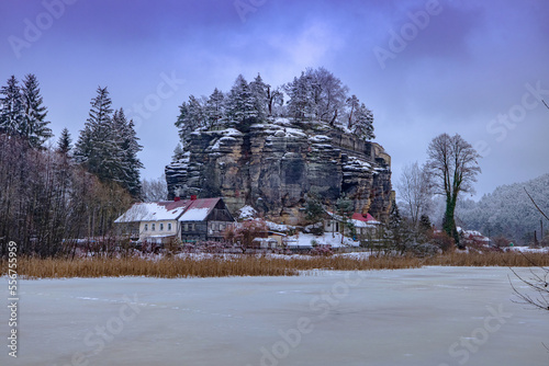 Impregnable medieval rock castle Sloup from the 13th century in Landscape of northern Bohemia, Czech Republic photo