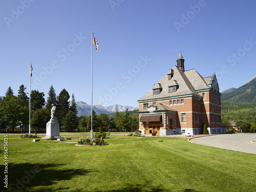 Fernie Court House building with a statue and Canada and British Columbia flags in front; Fernie, British Columbia, Canada photo