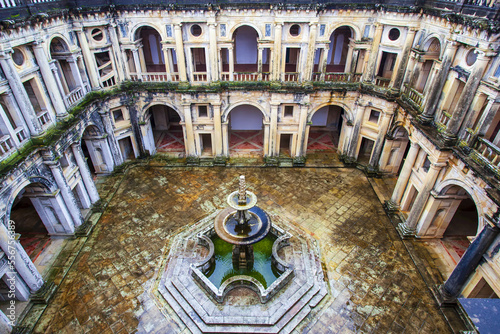 Inner courtyard and fountain of the King Joao III Cloister, Convent of Christ, Tomar, Portugal photo