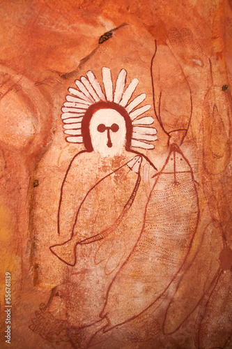 Close-up of Wandjina Aboriginal rock paintings on the sandstone walls in a cave at Raft Point; Western Australia, Australia photo