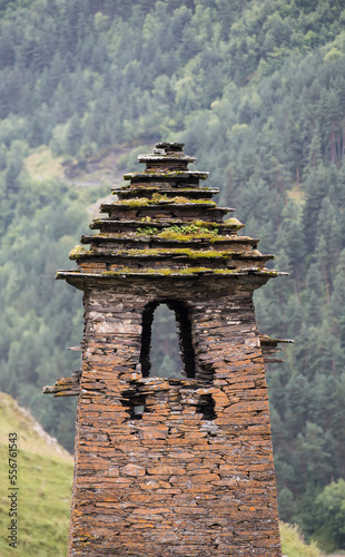 The ruins of a medieval stone tower with its traditional step pyramidal roof, in the village of Dartlo in Tusheti National Park; Dartlo, Kakheti, Georgia photo