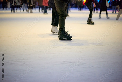 people ice skating.