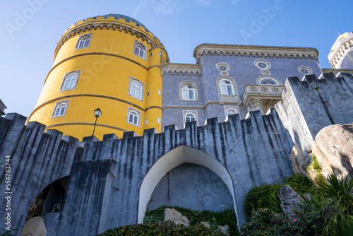 The hilltop castle of Palacio Da Pena with its colorful towers and stone wall situated in the Sintra Mountains; Sintra, Lisbon District, Portugal photo