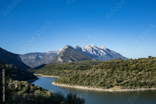 Mountains and lake near Su Gologone, Italy; Su Gologone, Sardinia, Italy photo