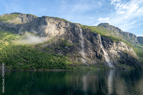 Waterfalls over the cliffs along the 15 Km Geirangerfjord in Sunnmore, Norway; Sunmore, Standa, Norway