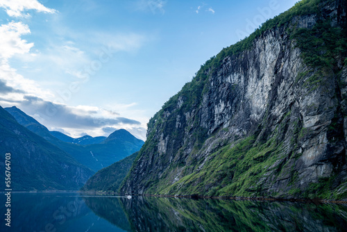 Spectacular views sailing through the 15 km long Geirangerfjord in Sunnmore; Geirangerfjord, Stranda, Norway photo