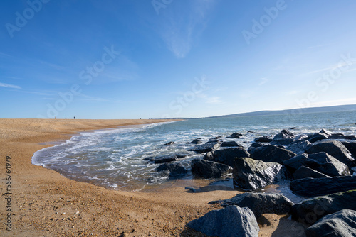 Shingle spit leading to Henry Vlll's Hurst Castle, Hampshire, England; Lymington, Hampshire, England photo