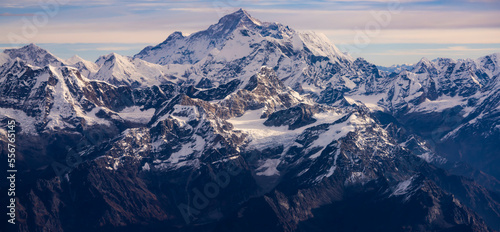 View of Mount Everest/Sagarmatha from a window on Dawn Kathmandu to Everest Flight over the Himalayas; Himalayas, Nepal photo