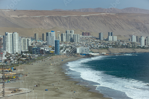 Coastline and cityscape of Iquique, Chile along the Pacific coast; Iquique, Chile photo