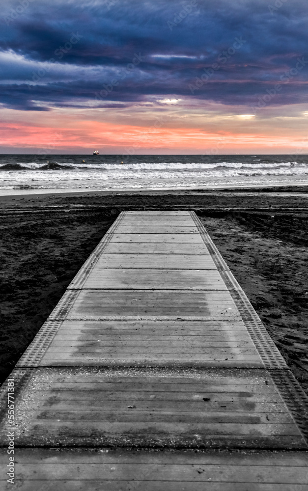 Fototapeta premium Wooden walkway at sunrise in Spain