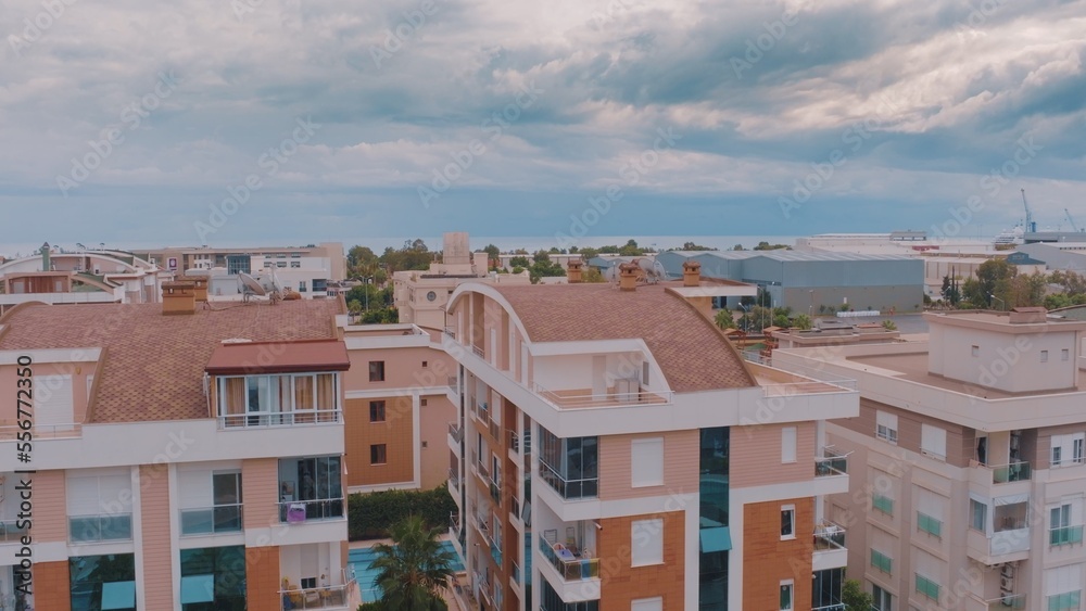 Top view of resort town on the background of the sea. Aerial drone view of houses and hotels