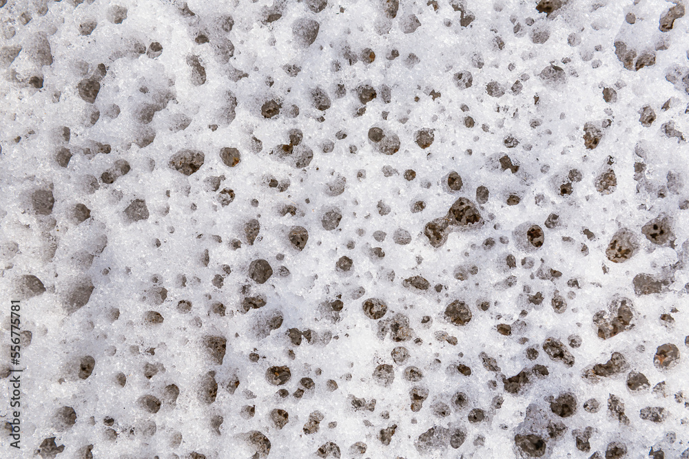 Pattern detail in the melting snow, Kobuk River; Northwestern Alaska, Alaska, United States of America Pattern detail in the melting snow, Kobuk River; Northwestern Alaska, Alaska, United States of America