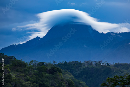 Cloud formation over the hills above Tufi fjord on the Cape Nelson peninsula, Oro Province, Papua New Guinea; Tufi, Oro Province, Papua New Guinea photo