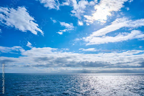Wallpaper Mural View from the Iceland ferry Norrona when approaching the Faroe Islands over blue ocean water and clouds in the sky; Faroe Islands, Denmark Torontodigital.ca