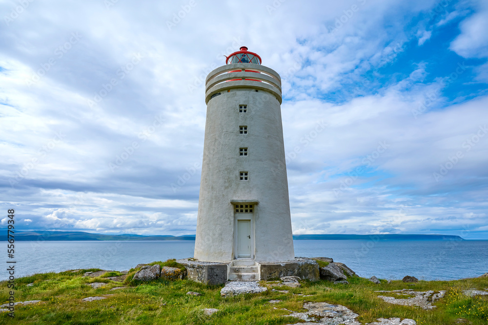 Lighthouse in summer, Phare de Skaro, on Vatnsnes Peninsula in Northern Iceland; Hvammstangi, Northern Region, Iceland Lighthouse in summer, Phare de Skaro, on Vatnsnes Peninsula in Northern Iceland; Hvammstangi, Northern Region, Iceland