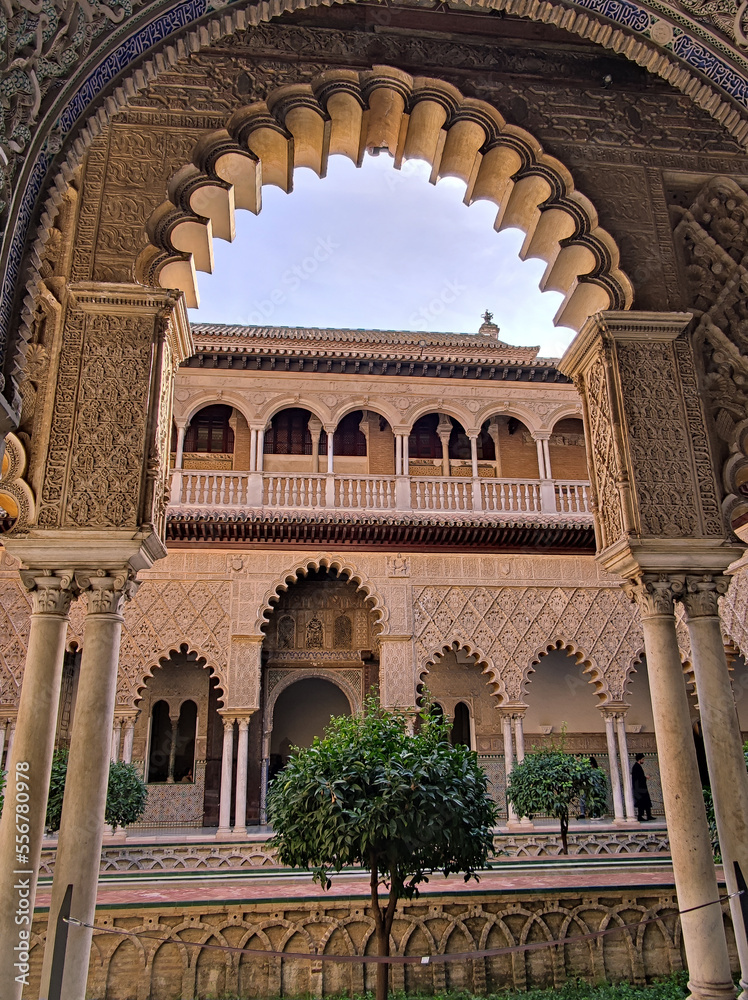 Detail of the architecture surrounding the Patio de las Doncellas courtyard in the Real Alcazar Spanish Royal Residence in Seville Spain
