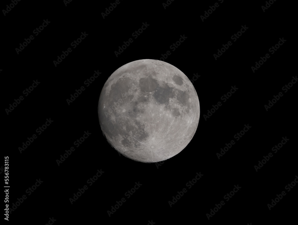 Obraz premium Moon just before Full, Waxing Gibbous with craters visible.