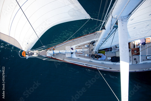 A sailboat from the tip of the mast. photo