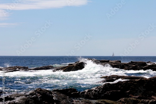 distant sailboat seascape