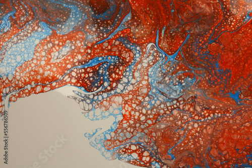 Art Abstract flow pour acrylic, ink and watercolor marble painting. Red and beige Color wave texture blots background. Fluid Art. © Liliia