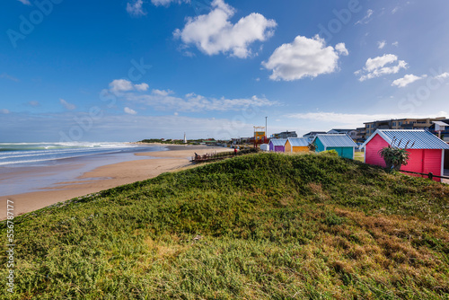 Colourful changing houses and lifeguarding station on Dolphin Beach at Jeffery's Bay on the Eastern Cape of South Africa; Jeffery's Bay, Eastern Cape, South Africa photo