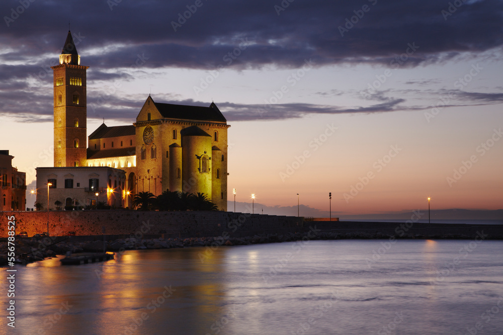 A dusk view of the harborside cathedral in Trani.; Trani, Puglia, Italy. A dusk view of the harborside cathedral in Trani.; Trani, Puglia, Italy.