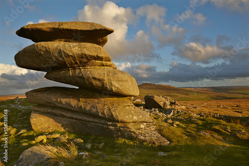 Rocks on Rough Tor bathed in sunset light, on Bodmin Moor, Cornwall, Great Britain.; Rough Tor, near Camelford, Bodmin Moor, Cornwall, southwest England, Great Britain. photo