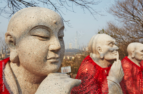 Statues of Luohan, or living Buddhas, at Jiuhuashan Temple, near Xuanwu Lake, Nanjing, Jiangsu province, China.; Jiuhuashan Temple, Nanjing, Jiangsu province, China. photo