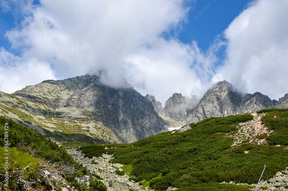 Obraz premium Skalnate pleso at the lowest corrie of the Rocky Valley and peak of Lomnicky Stit at the National park High Tatras, Slovakia