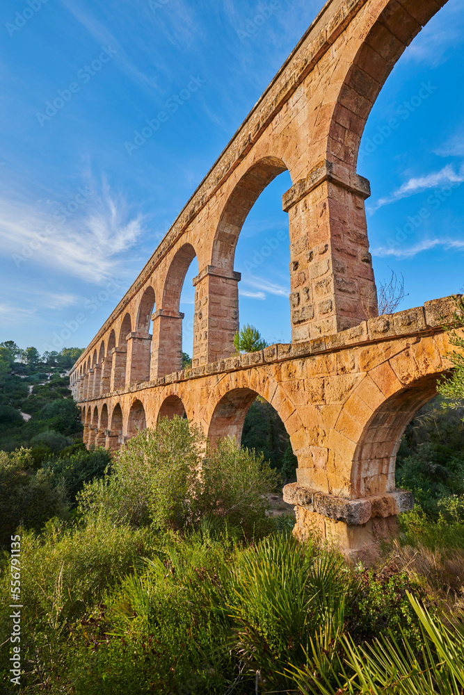 Old, Roman aqueduct, the Ferreres Aqueduct (Aqüeducte de les Ferreres) also known as Pont del Diable (Devil's Bridge) near Tarragona; Catalonia, Spain Old, Roman aqueduct, the Ferreres Aqueduct (Aqüeducte de les Ferreres) also known as Pont del Diable (Devil's Bridge) near Tarragona; Catalonia, Spain