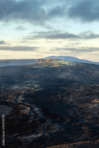 The Fagradalsfjall Volcano stands silent against the setting sun following a recent eruption; Iceland