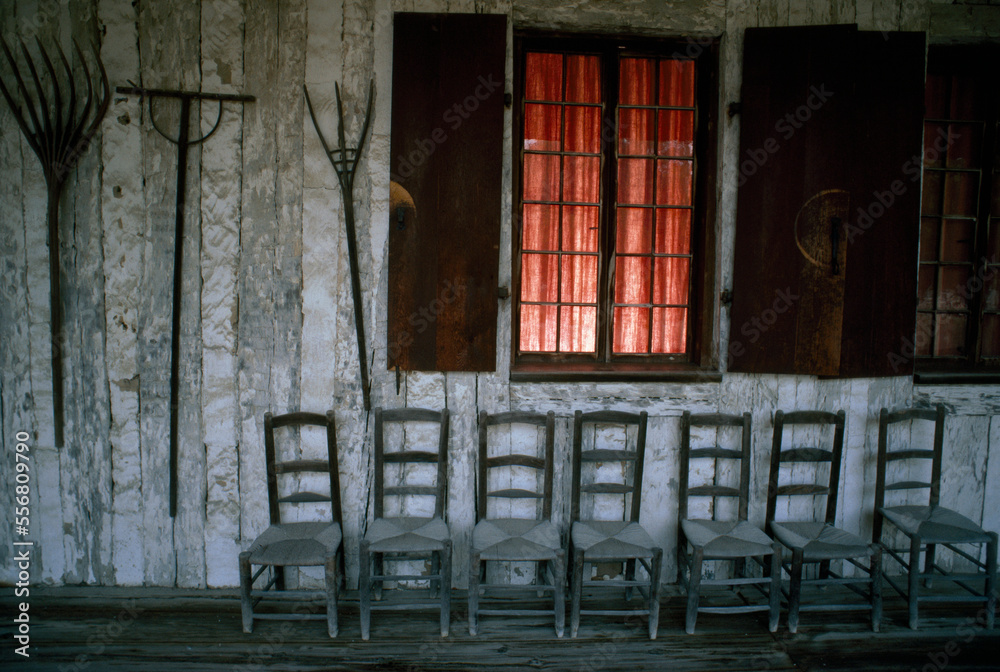 Porch of the Bolduc House Museum with antique chairs and rakes on display; Sainte Genevieve, Missouri, United States of America Porch of the Bolduc House Museum with antique chairs and rakes on display; Sainte Genevieve, Missouri, United States of America