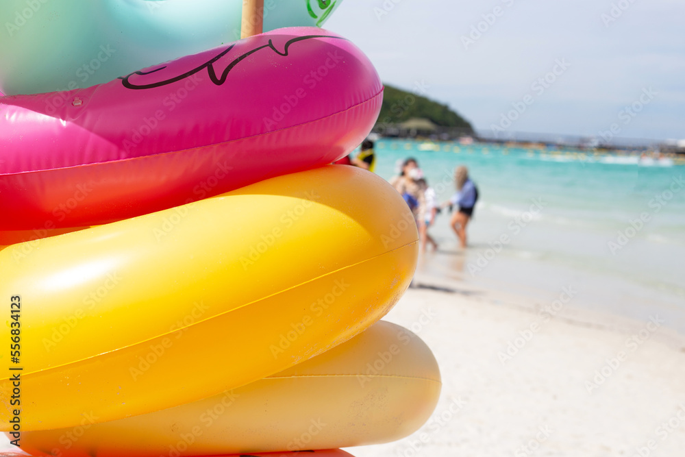 Inflatable rings on the beach. Summer concept