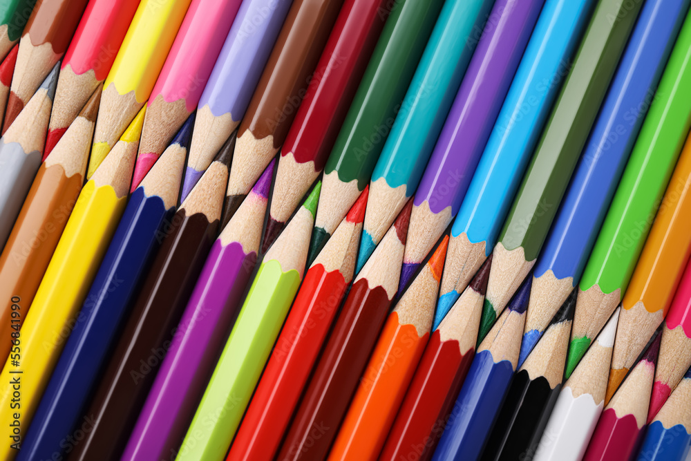 Many colorful wooden pencils as background, top view Many colorful wooden pencils as background, top view