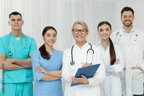 Portrait of medical doctors wearing uniforms indoors photo