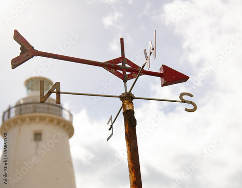 Top of Cape Willoughby lighthouse on Kangaroo Island and red weather vane shows wind is blowing from the south. Erected in 1852. photo