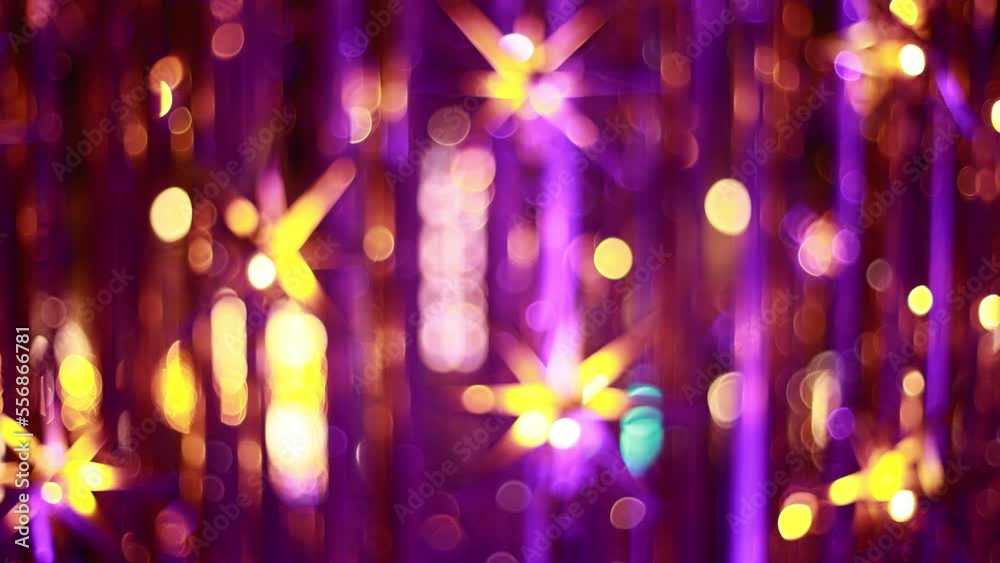 Color changing neon light tubes and stars, blurring image
