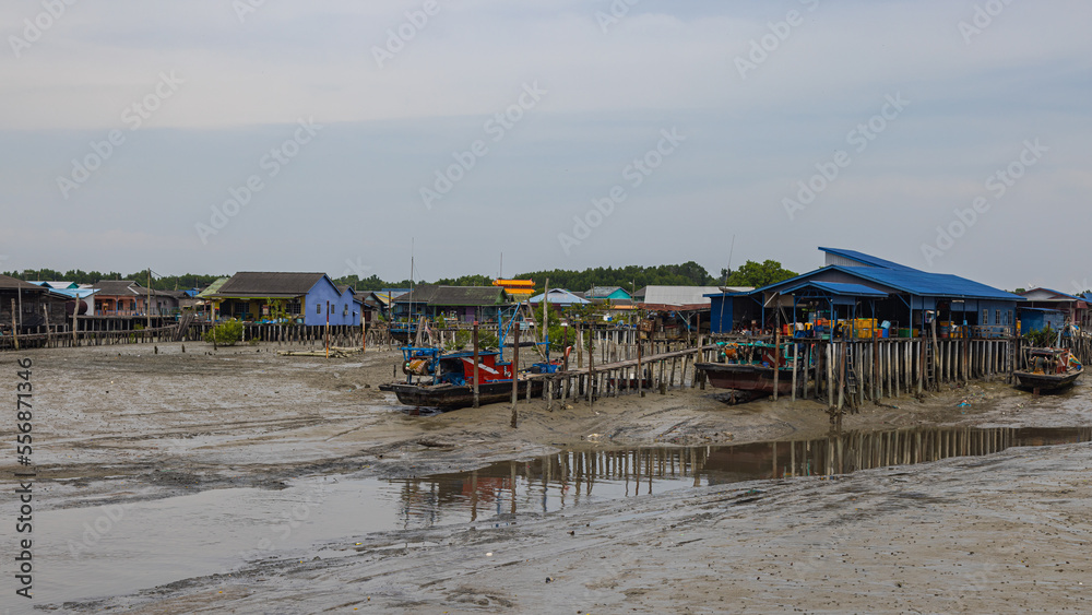 Pulau Ketam, Malaysia - December 26, 2022: Pulau Ketam, translated, crab island, A small island located off the coast of Klang. Fisherman village built on stilts on the shore of the island. Pulau Ketam, Malaysia - December 26, 2022: Pulau Ketam, translated, crab island, A small island located off the coast of Klang. Fisherman village built on stilts on the shore of the island.